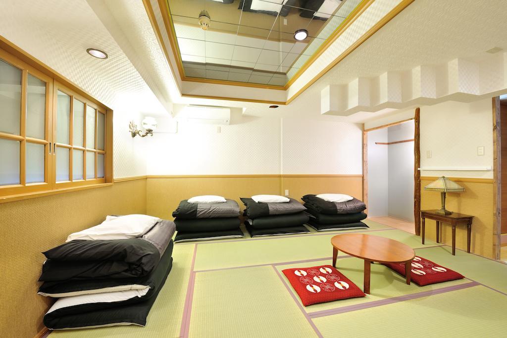 Khaosan World Asakusa Ryokan Токио Номер фото