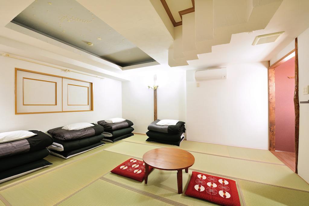 Khaosan World Asakusa Ryokan Токио Номер фото
