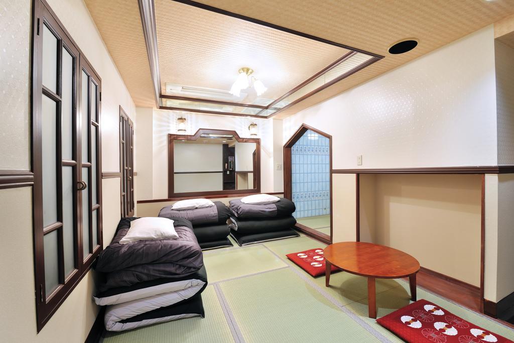 Khaosan World Asakusa Ryokan Токио Номер фото